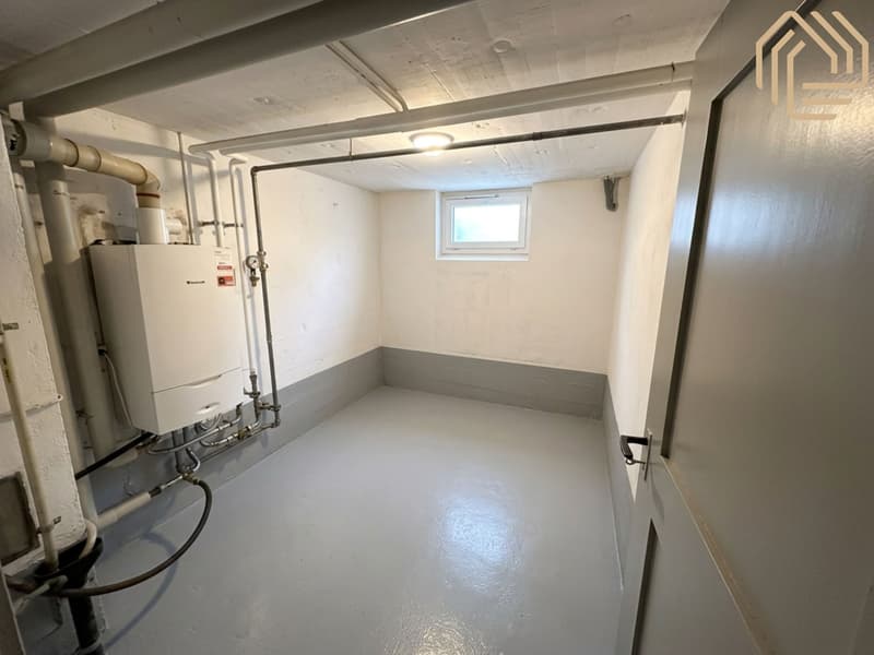 Appartement exclusif de 5,5 pièces – avec garage et véranda (12)
