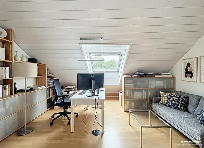 Desk with computer, chair, bookshelves, couch, glass table, skylight window
