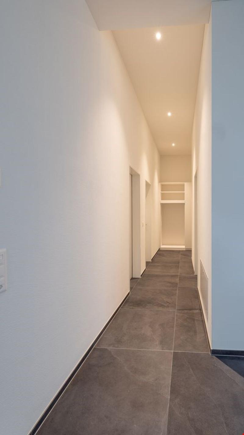 3,5-Zimmer EG-Wohnung mit extrahohen Räumen und privater Hof-Loggia (9)