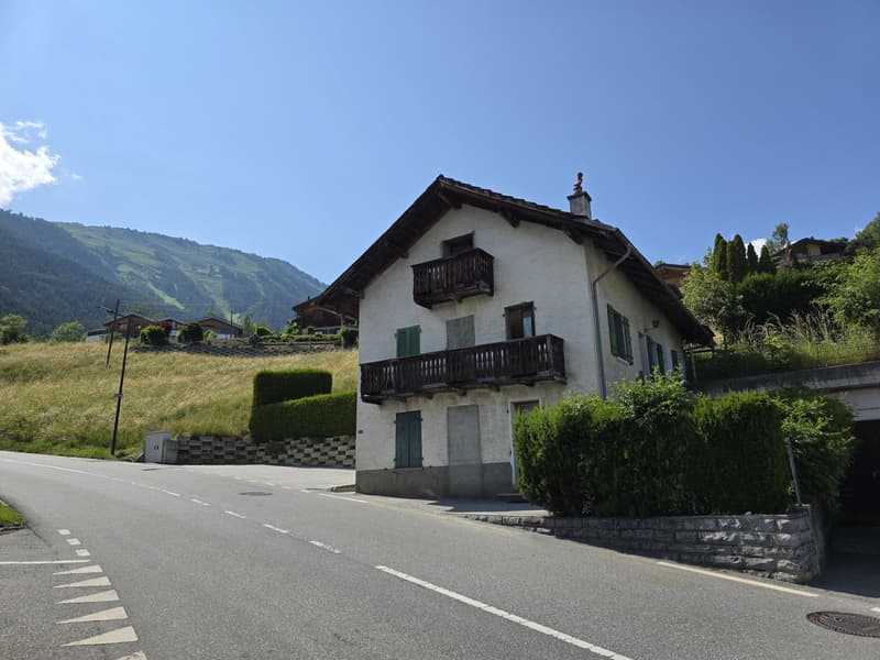 Casa a schiera di 3.5 locali / giardino, posti auto, cantina e garage (2)