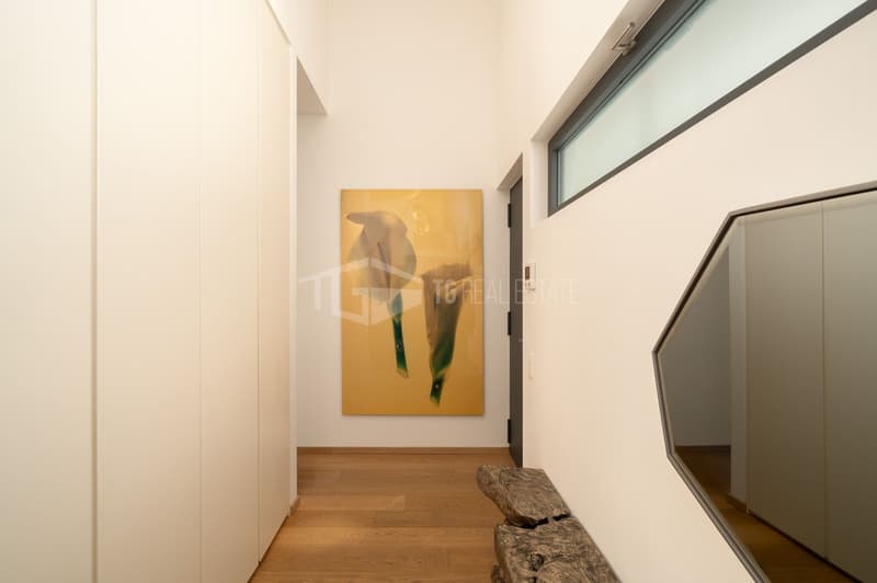 ELEGANTE APPARTAMENTO DI 4 LOCALI CON GIARDINO E VISTA LAGO (14)
