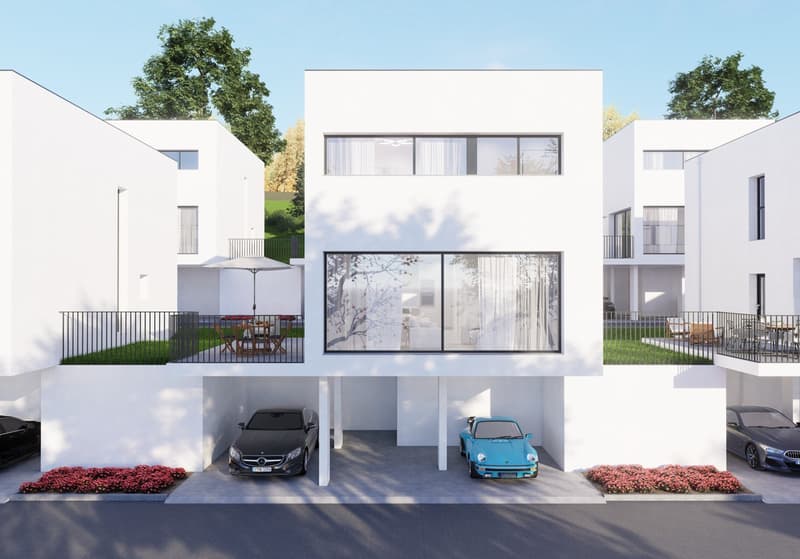 2-story modern white house with large windows, garage, and parking spaces in the front. The house is surrounded by trees and greenery, creating a peaceful and natural setting.