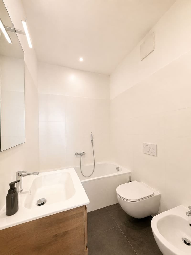Esclusivo attico duplex di 5,5 locali con loggiato panoramico e giardino privato nel cuore di Origlio (11)