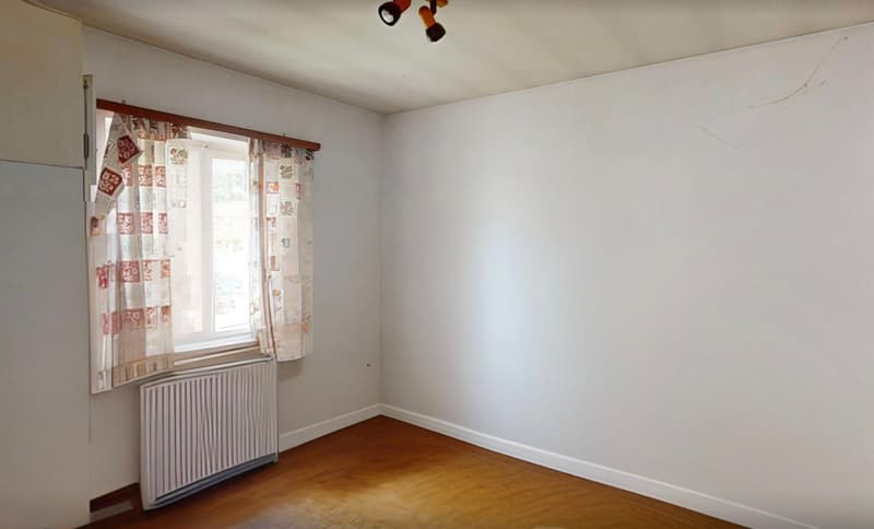 Zentrales Mehrfamilienhaus in Minusio mit Seesicht und Ausbaupotenzial (13)
