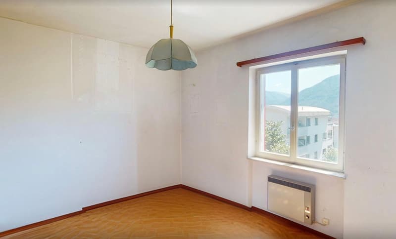 Zentrales Mehrfamilienhaus in Minusio mit Seesicht und Ausbaupotenzial (12)