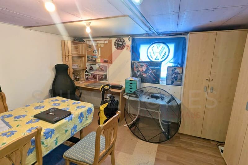 Casa multifamiliare nella zona centrale di Grossdietwil con spazio commerciale e potenziale di sviluppo polivalente (5)