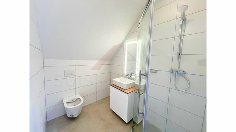 Multifamily house with 3 renovated apartments and good rental potential in Courrendlin (4)