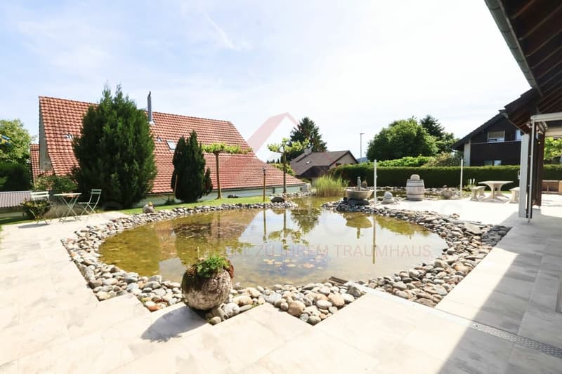 Family paradise with a dreamy garden & natural pond in Hagneck (5)