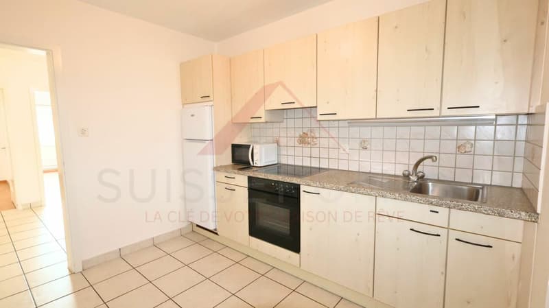 Marly - Appartement 3.5 pièces rénové avec balcon ensoleillé et vue verdoyante (8)