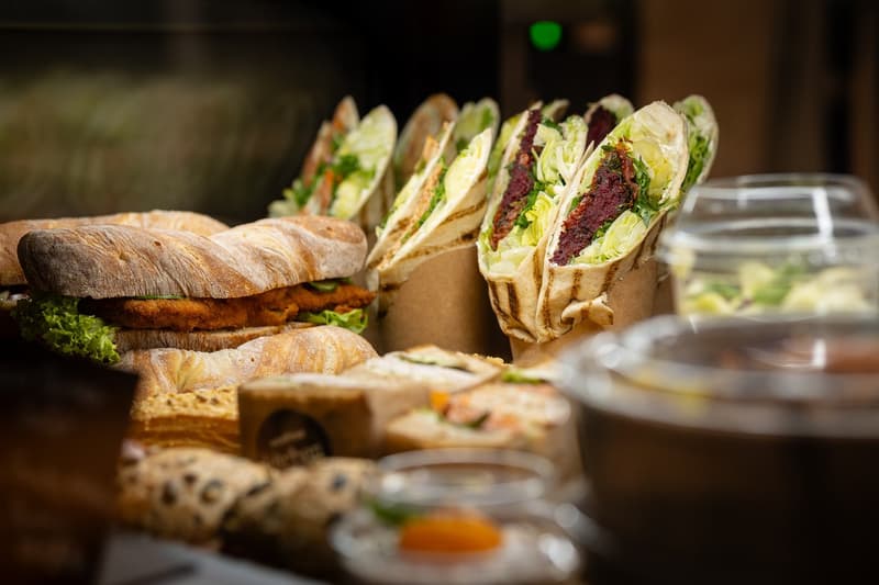 Sandwiches, wraps, breads, and other foods in containers