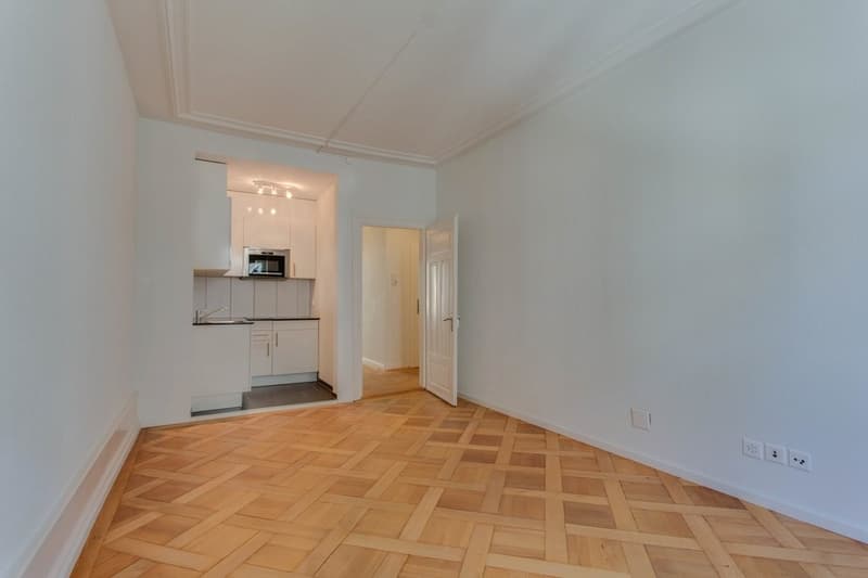 4547.01.0202_Wohnzimmer_Ansicht_Richtung_Kueche.png