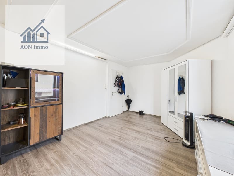 empty room, wooden floor, white walls, wooden cabinet, white wardrobe, door, umbrella, shoes