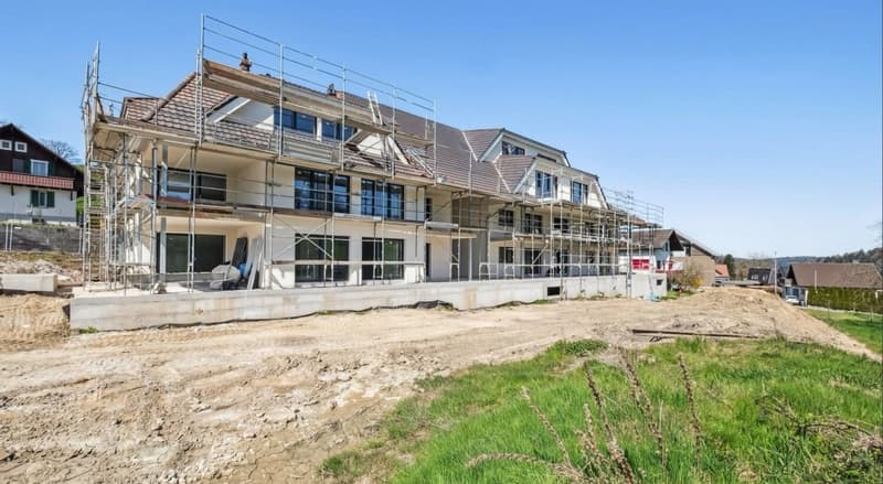 Two story house, white wall, grey roof, under construction, scaffolding, dirt ground, workers