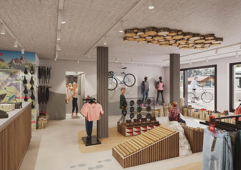a store interior with clothes, shoes, and bicycle displayed