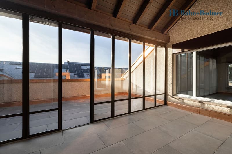 glass doors, tiled floor, wooden ceiling, panoramic windows, outdoor terrace