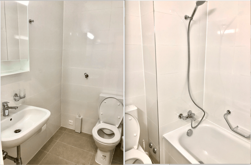 modern bathroom with white tiles, white sink, white toilet, bathtub, shower head