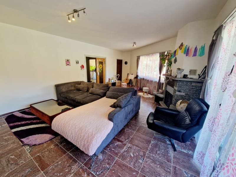 Appartement 5,5 pièces au 1er étage, avec parking couvert et terrasse dans une maison mitoyenne (4)