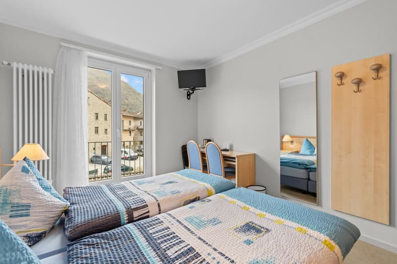 Hôtel historique avec restaurant, grotto et terrain à bâtir – une occasion rare au cœur du Tessin (22)