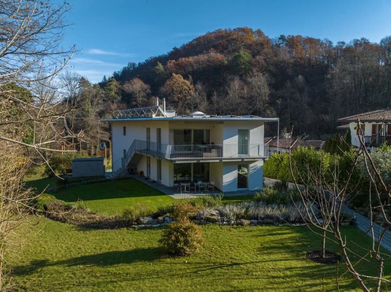 Modern 4.5-room apartment with private garden, fireplace, and fitness room – an oasis of peace in Arcegno (5)