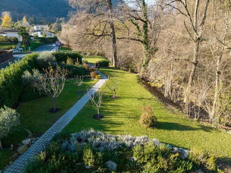 Modern 4.5-room apartment with private garden, fireplace, and fitness room – an oasis of peace in Arcegno (3)