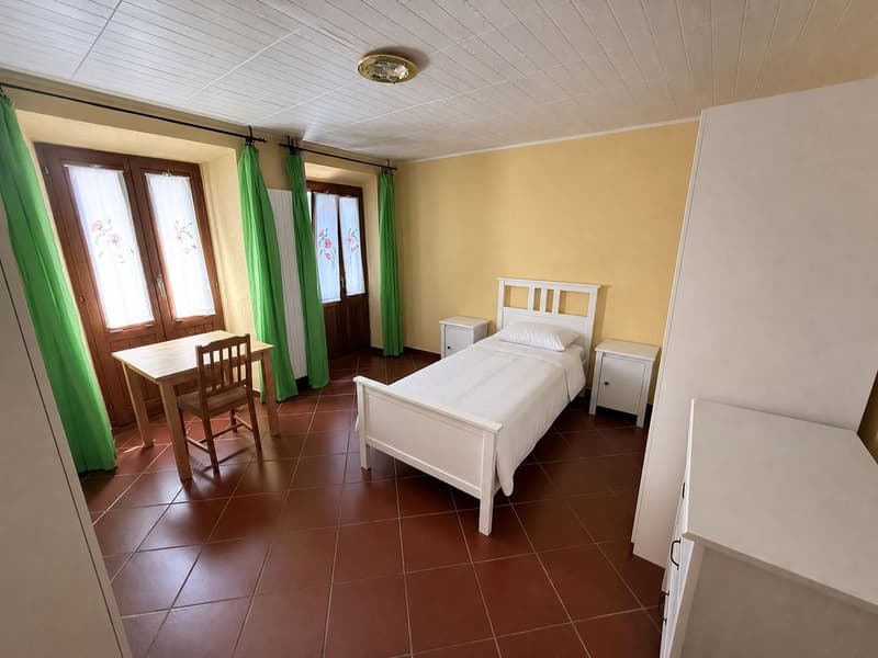 Charming Multi-Family Property with 3 Residential Units in the Heart of Melano (9)