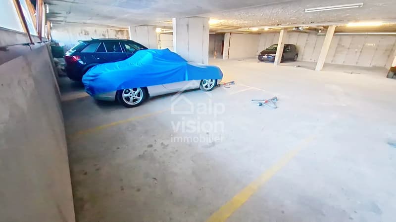 OPPORTUNITÉ RARE: PARKING COUVERT AU CENTRE DE VEYSONNAZ (2)