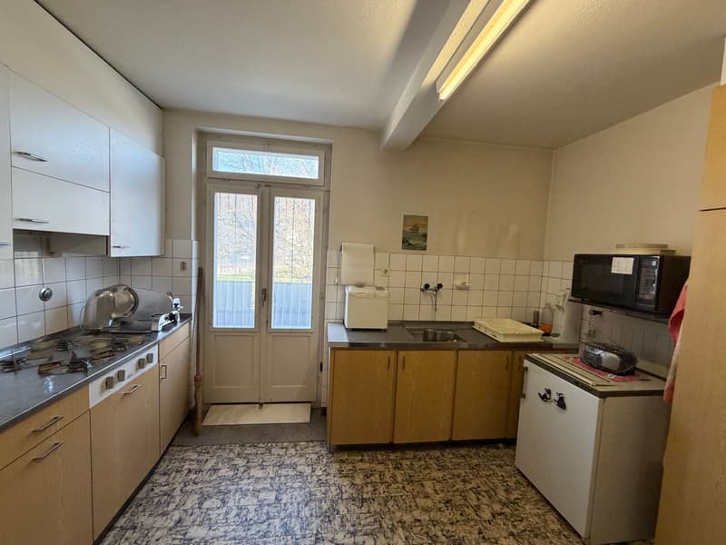 Residential and commercial building with construction land reserve in Strengelbach (6)