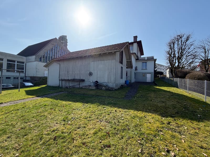 Residential and commercial building with construction land reserve in Strengelbach (3)