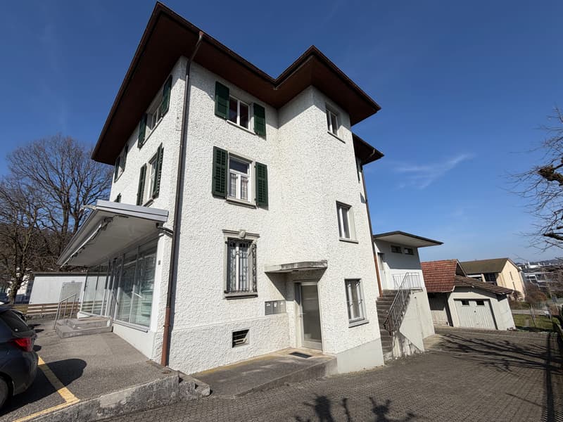 Residential and commercial building with construction land reserve in Strengelbach (1)