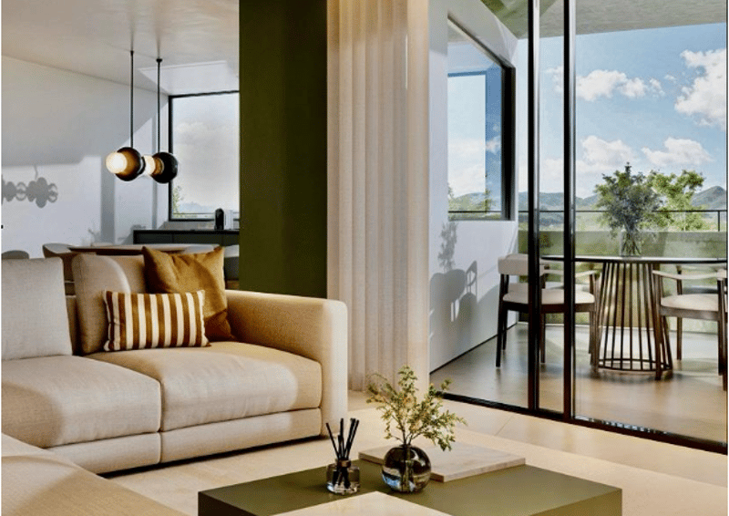 neutral colors, couch, round coffee table, large sliding glass doors, outdoor dining table
