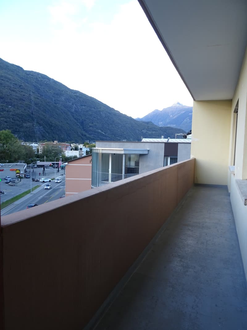 concrete terrace, overlooking city and mountains