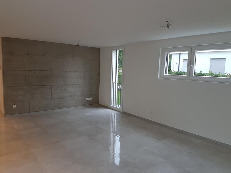empty room, tiled floor, large windows, balcony with metal railing