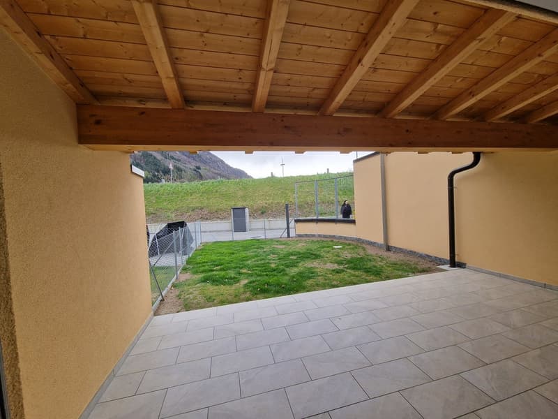 covered terrace, tiled floor, wooden ceiling, fenced yard, green grass, mountain view