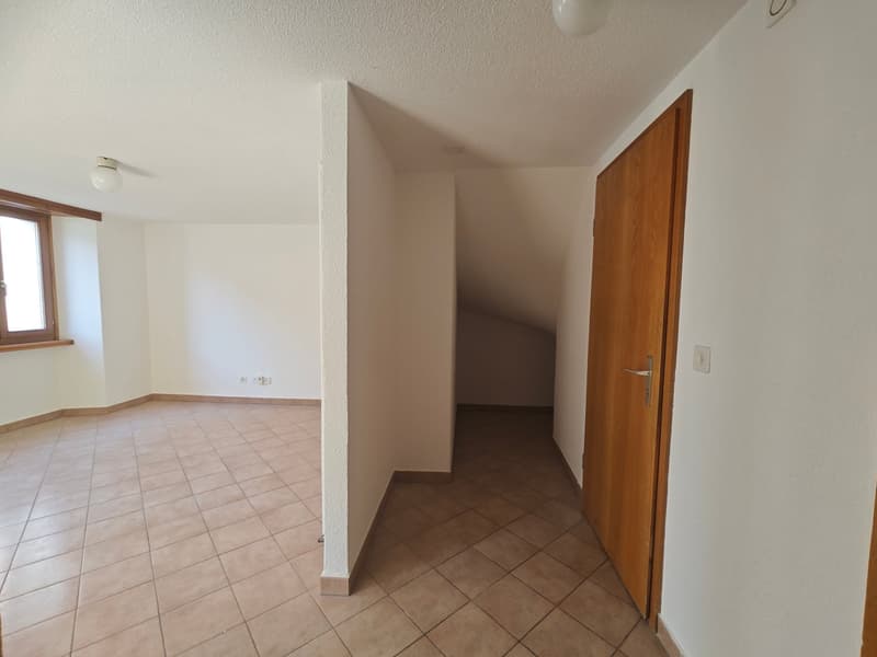 tiled floor, wall outlet, window, wooden door