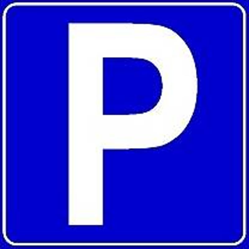 Blue background with white parking sign