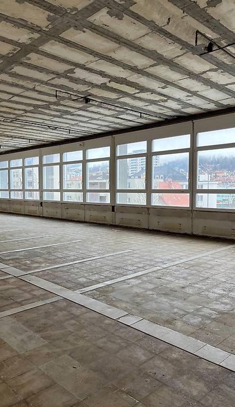 empty building, large windows, view of the city