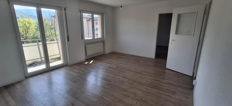 wooden floor, radiator, sliding glass door, open door