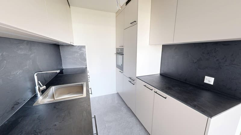 Appartamento di 3,5 locali ristrutturato con balcone a Ostermundigen (11)