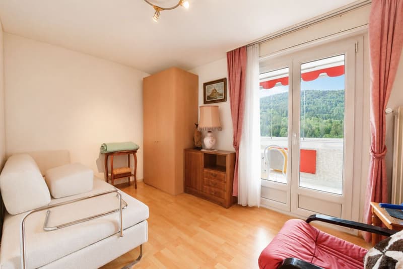 Bright attic with balcony and green view (6)
