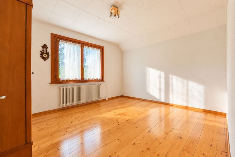 Maison individuelle de 5.5 pièces avec grand jardin au Locle (10)