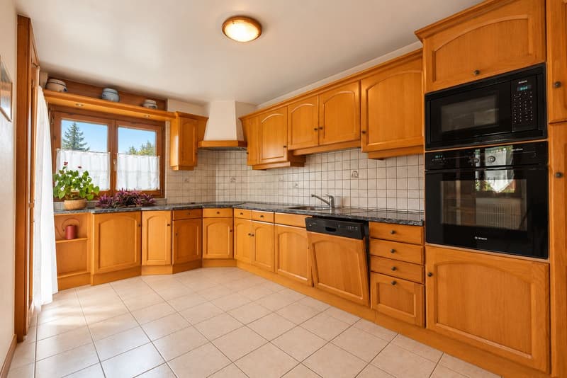 Maison individuelle de 5.5 pièces avec grand jardin au Locle (4)
