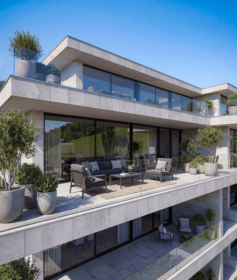 Modern house, concrete exterior, large glass windows, outdoor seating area, multiple balconies, greenery