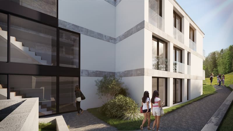 Contemporary building, white exterior, large windows, pathway leading to entrance, outdoor staircase