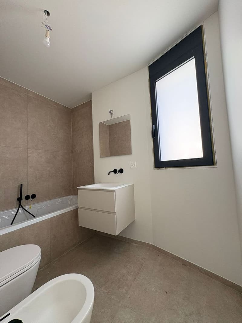 Appartement moderne de 3.5 pièces avec grande terrasse à Giubiasco (11)