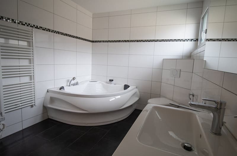 Casa a due famiglie a Sumiswald – 11 stanze, moderna e familiare (5)
