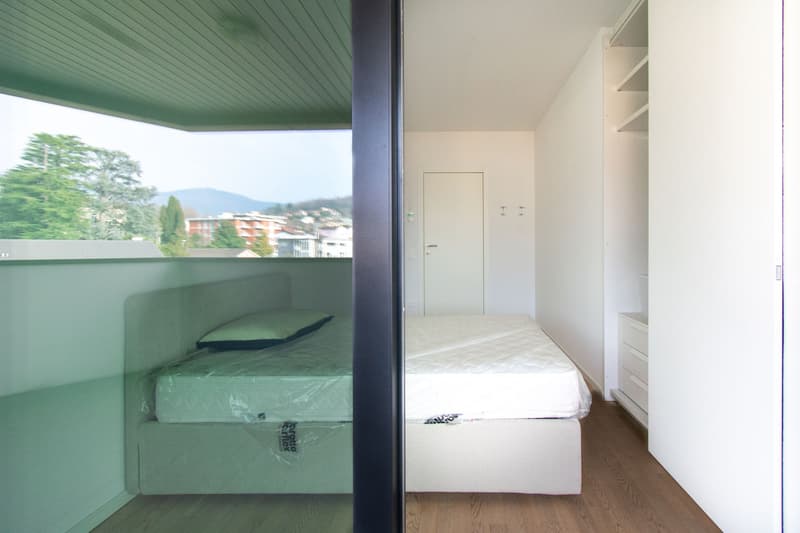 RAFFINATO APPARTAMENTO DI 4.5 LOCALI ARREDATO CON TERRAZZA PANORAMICA (12)