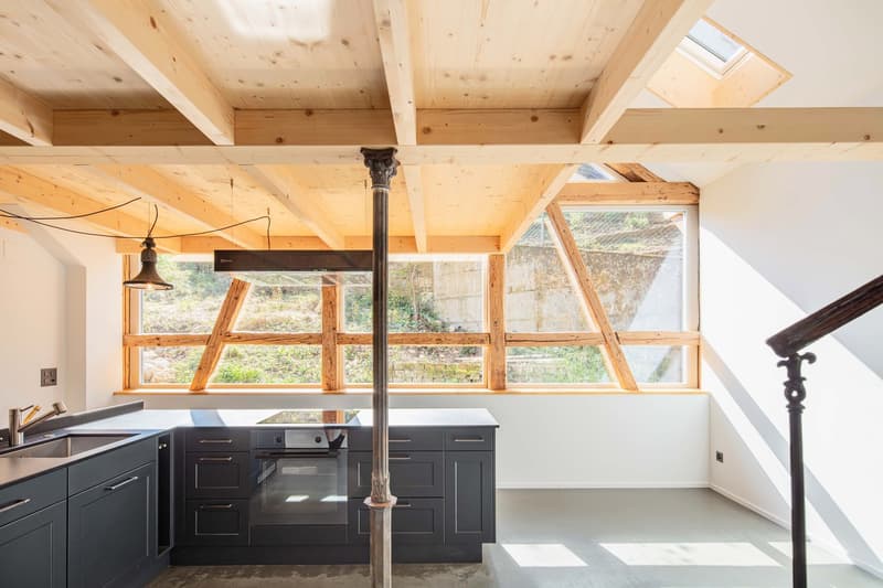 kitchen, large windows, wooden beams, modern appliances, natural light