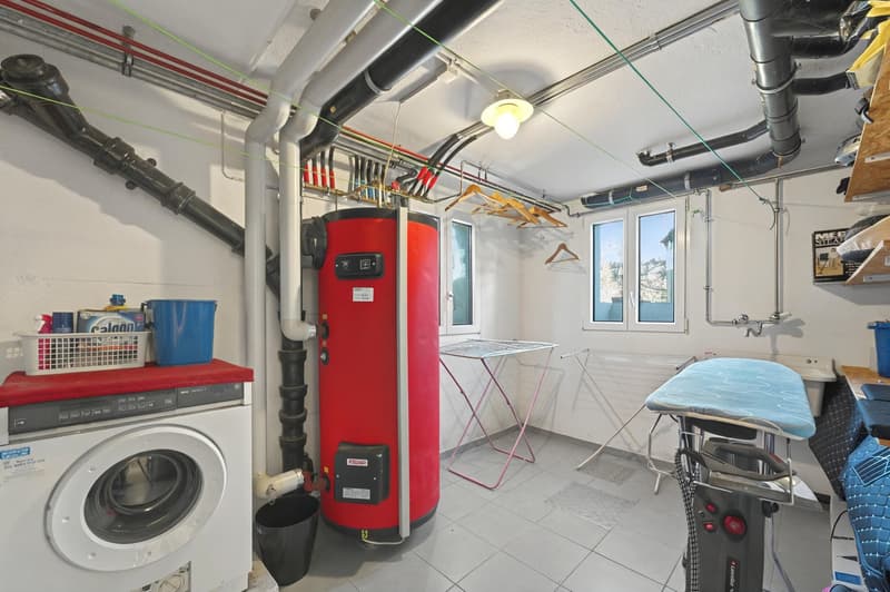 utility room, washing machine, water heater, clothes drying rack, ironing board, ironing machine, shelves, folded clothes