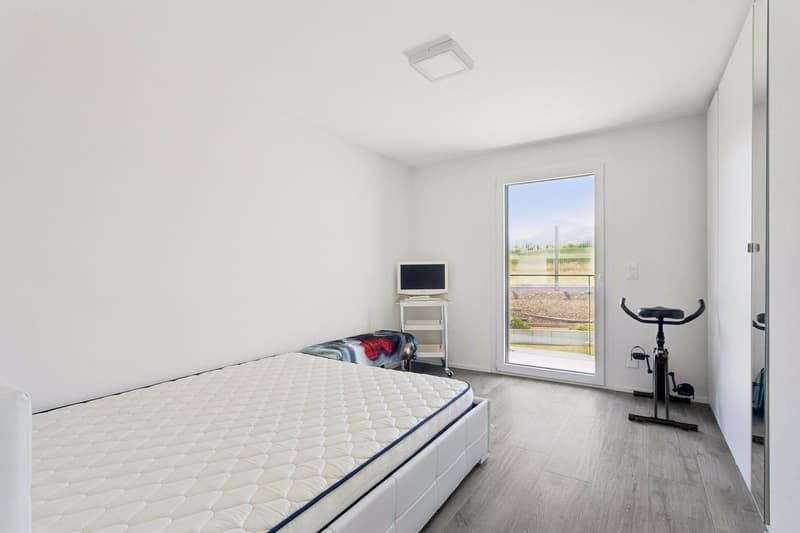 Chambre à coucher avec accès au balcon