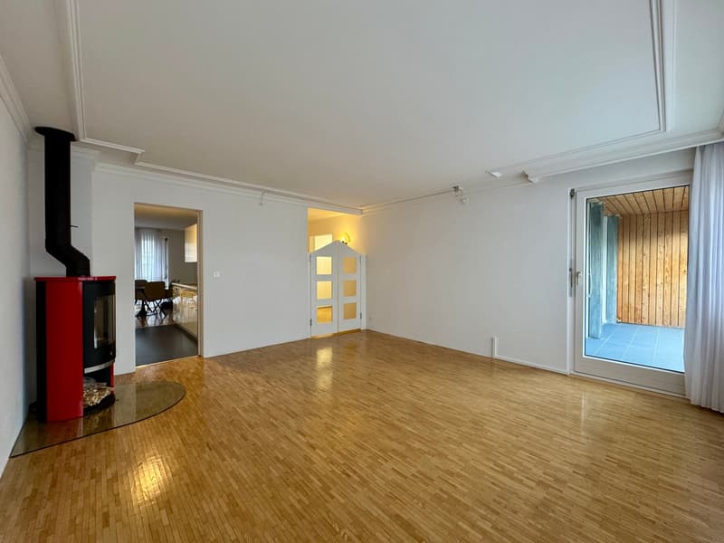 empty room, hardwood floors, fireplace, sliding glass doors to deck